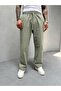 Green linen baggy trousers
