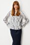 Patterned Blouse with Metal Brooch on the Shoulder