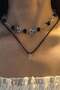 قلادة على الطراز العتيق مكونة من قطعتين برباط على شكل نجمة