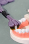 Set of 2 Triple-Surface Soft-Tipped Toothbrushes – Purple & Green One-Movement Full Cleaning Ergonomic Handle - 3