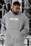 سويت شيرت كبير الحجم مطبوع عليه KEEP RUN