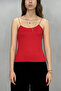 بلوزة نسائية بشريط أحمر