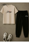 Stay Strong Printed Plus Size Beige T-Shirt & Black Pants Tracksuit Set - 2