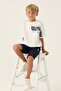 طقم برمودا Brush Pattern من U.S. Polo Assn للأولاد، بنقشة فرشاة، باللون الكريمي - 3