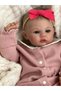 49CM JOYORA'S LIFELIKE 49CM HUMANOID DOLL, MADE OF SOFT AND FEATURING A FASHIONABLE CARTOON THE...