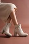 Women's Beige Heeled Luxury Boots with Buckle Detail and Stylish Design