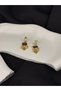 Gold Detailed Purple Colored Zircon Stone Brand Model Earrings