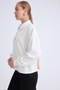 بلوزة بأكمام طويلة وأزرار كبيرة - 2
