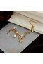 Double-layered heart-detailed pearl bracelet. - 2
