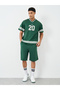 Men Green V Neck Printed Boxy T-Shirt and Oversized Shorts Co-Ords