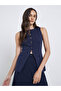 بلوزة بدون أكمام بأزرار باللون الأزرق الداكن