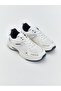 White lace-up women's sneakers by güli̇s gi̇yi̇m