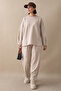 Double Suit with Pockets on the Sleeves and Legs, Beige
