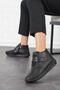 Maylo bone protruding genuine leather boots black skin