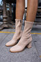 Sonja Woman. Nude Stretch Heel Boots - 7