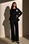 Women's Black Knitwear Set with Floral Accessories