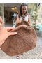 حقيبة مدرسية بنية اللون