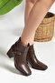 Women's Heel Boots with a Striking Buckle from Kare Burun A64