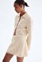 Crochet-look mini skirt - 4