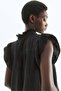 بلوزة موسلين بأكمام مطوية