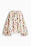Flounce-cuff blouse