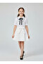 Girl's White Shirt with Black Bow and Piping Detail White Flared Skirt Performance Set April 23 October 29 - 2