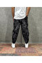 Baggy Pants with Elastic Waistband, Pocket, Ribbed Detail and Patterned Design. - 2