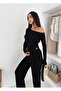 Blouse with an asymmetric neckline, long sleeves, and one shoulder exposed. Long pants with elastic waist. - 5