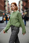 Women's Oversized Knit Crop Sweater with Low Sleeves and Flowing Detail Offers Modern Chic with Its Soft Texture