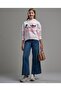Washed Flared Jeans with Button Closure
