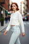 Women's Oversized Knit Crop Sweater with Low Sleeves and Flowing Detail Offers Modern Chic with Its Soft Texture