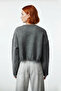 Women's Oversized Knit Crop Sweater with Low Sleeves and Flowing Detail Offers Modern Chic with Its Soft Texture - 4