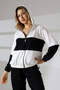 Hooded two-piece suit with elastic waist and zip cuffs - 2