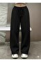 Loose wide-leg black sweatpants made of comfortable, non-sweating fabric