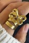Steel Ring with Gold Color Ribbon Figure