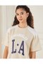 Senior Girls Beige Oversize Varsity T-Shirt - 4