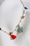 White Necklace with Clover Pendant and Blue Stars