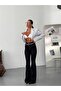 Jeanshose mit spanischem Bein - 3