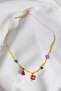 Yellow Necklace with Clover Pendant and Purple Stars