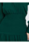 3 tiered dress in emarald green with Asymmetrical bottom - 4
