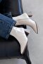Liston Women's Heeled Wrinkled Leather Boots Beige
