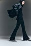 Flared rib-knit trousers