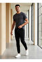 Solid Joggers With Drawstring Closure And Pockets - 2