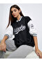 سترة نسائية قصة فضفاضة من Varsity Bomber