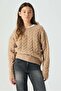 Embellished cable-knit jumper