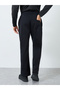 Men Black Embroidered Oversized Joggers - 4