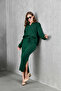 طقم نسائي مكون من سترة وبنطلون تريكو بياقة بولو وفتحة نصفية قصة فضفاضة