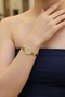 Gold Color Monogrammed Steel Handcuff Bracelet - 2