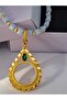 Blue Beaded Green Stone Quarter Pendant That Can Be Attached to a Necklace.