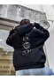 سويت شيرت بقلنسوة كبير الحجم مطبوع عليه جالاكسي باللون الأسود للجنسين - 2